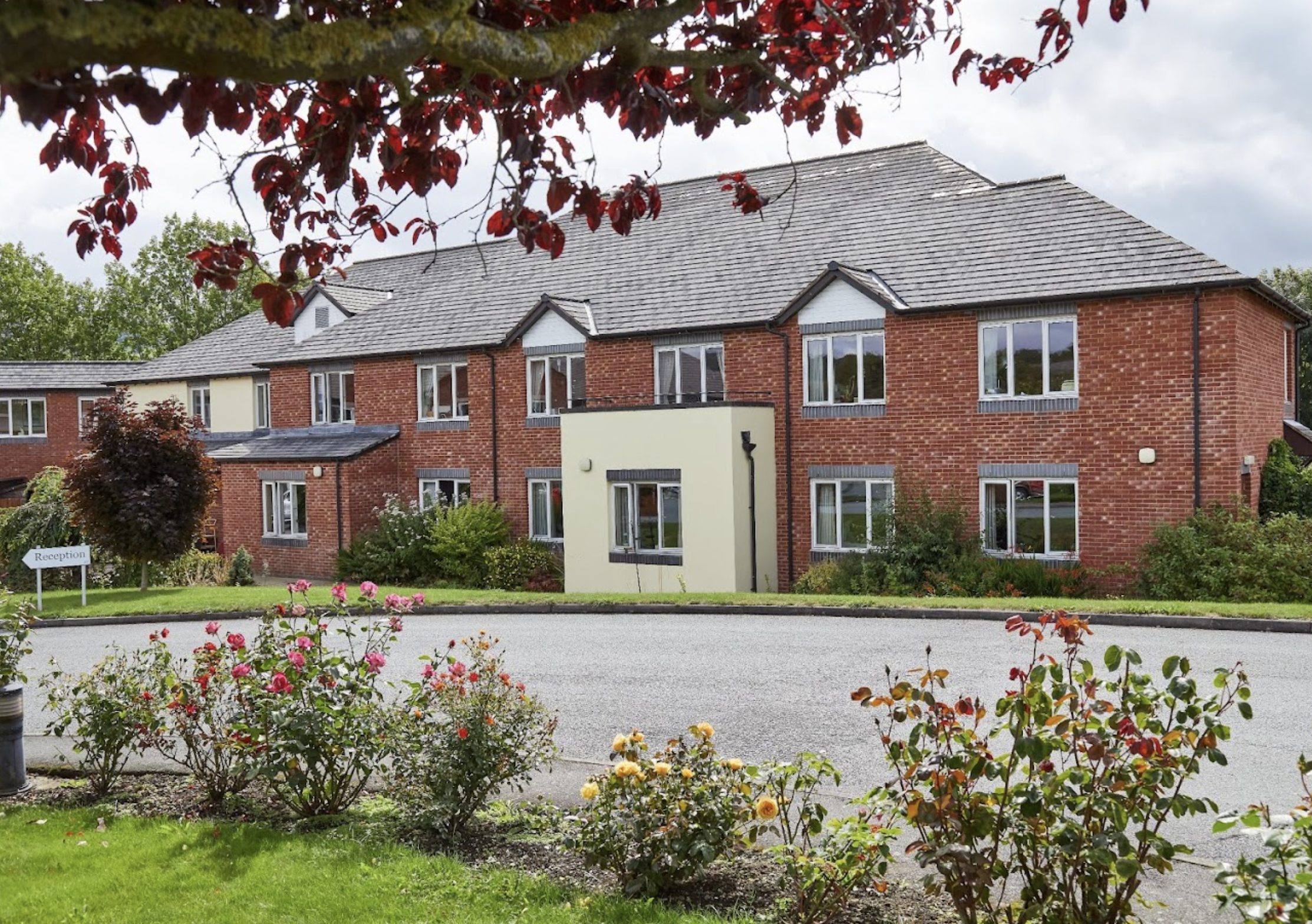 Exterior of The Rhallt care home in Welshpool, Wales