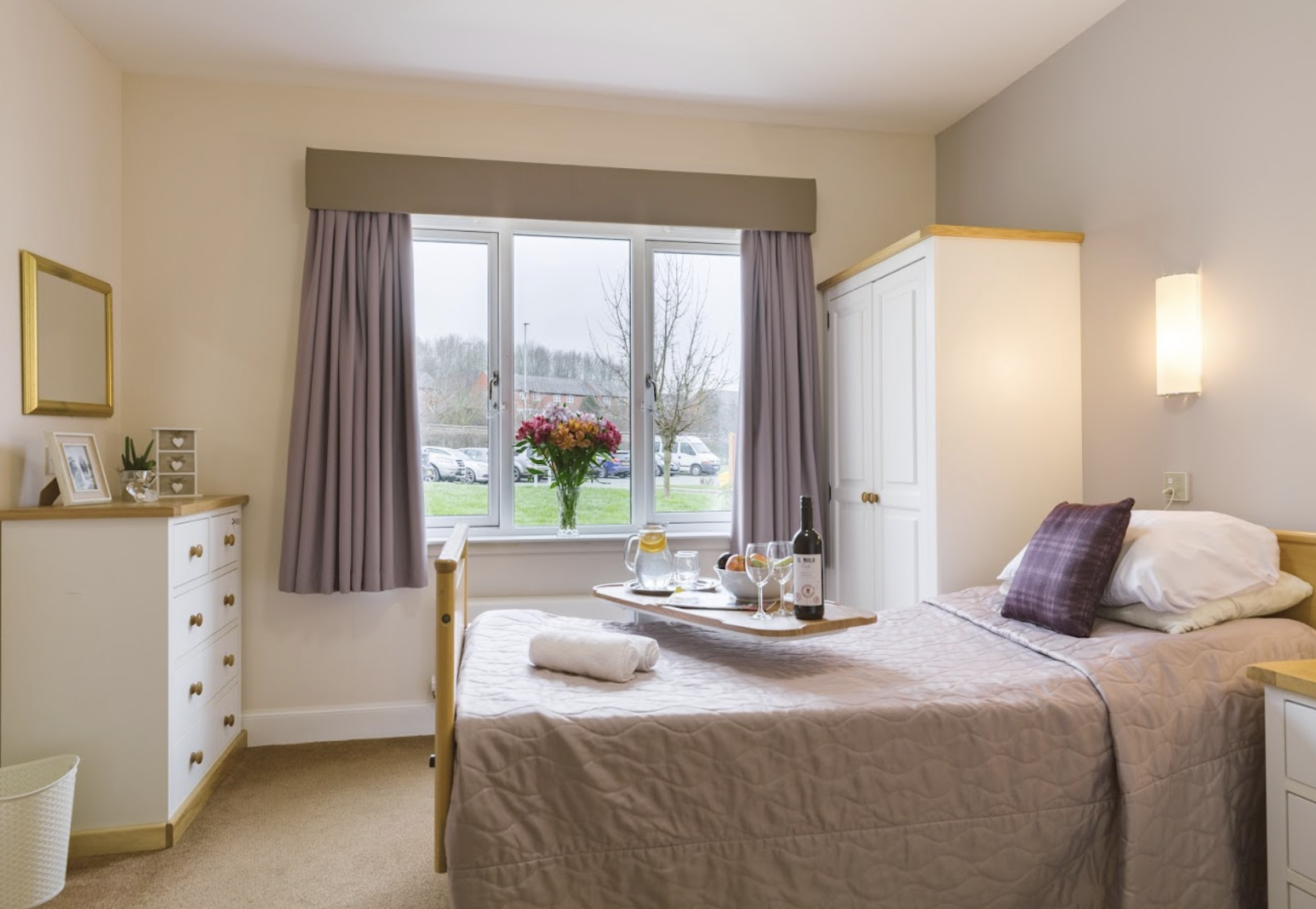 Bedroom of The Rhallt care home in Welshpool, Wales