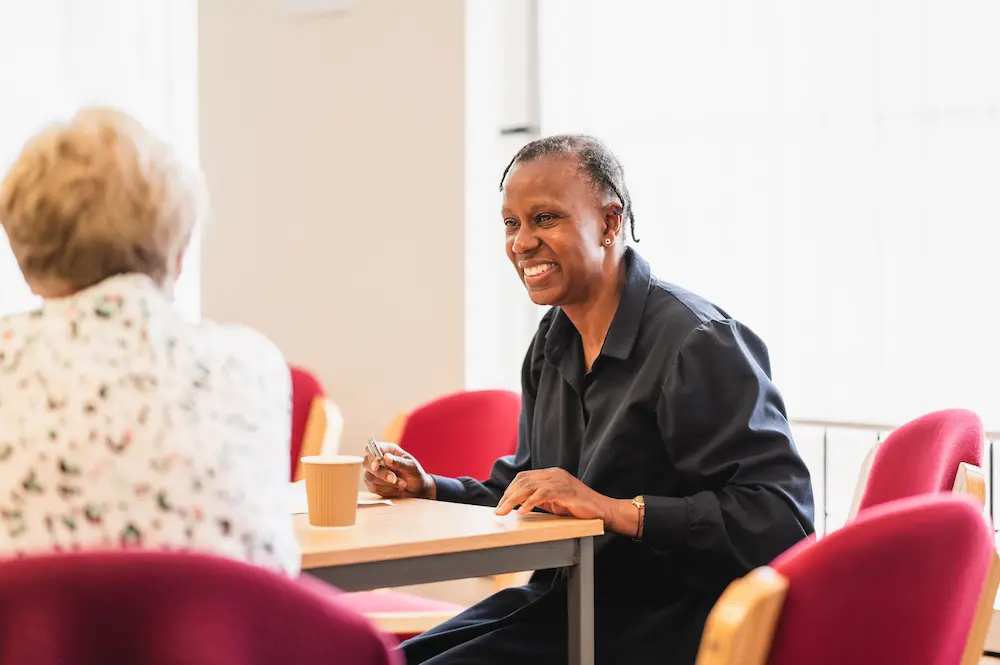 An advocate chatting with a care seeker