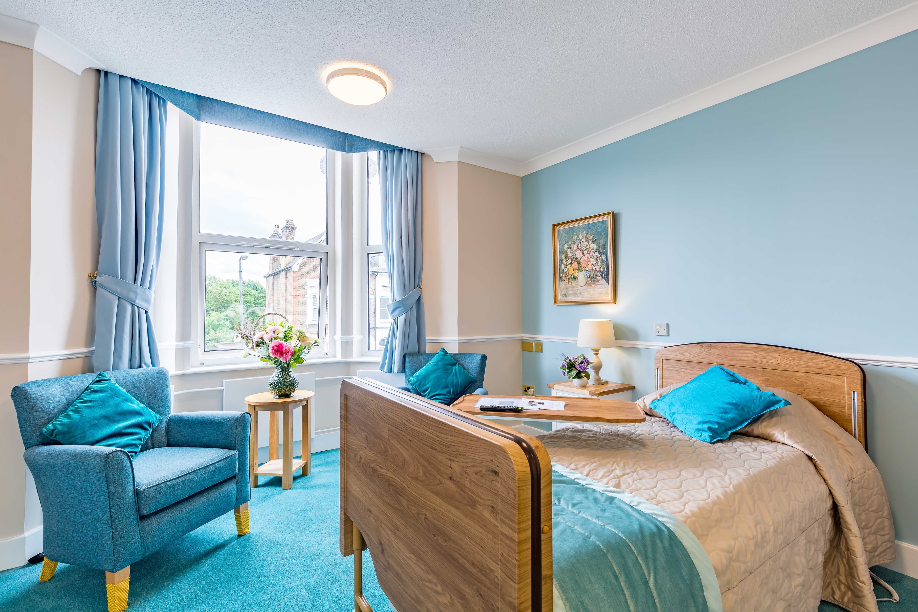 Bedroom at Queen Court Care Home in Wimbledon, Merton