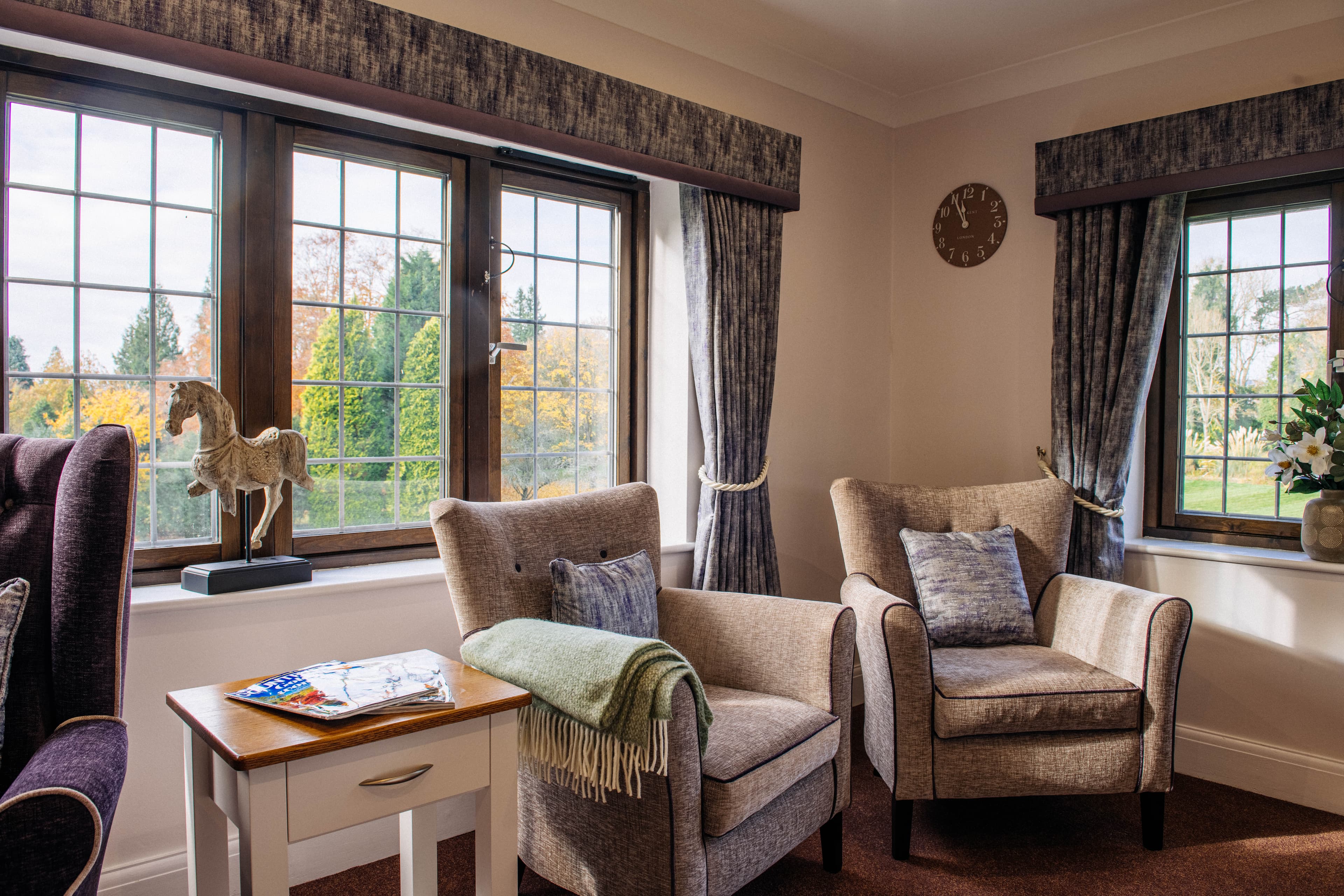 Communal Lounge at Reigate Beaumont Care Home in Reigate, Surrey