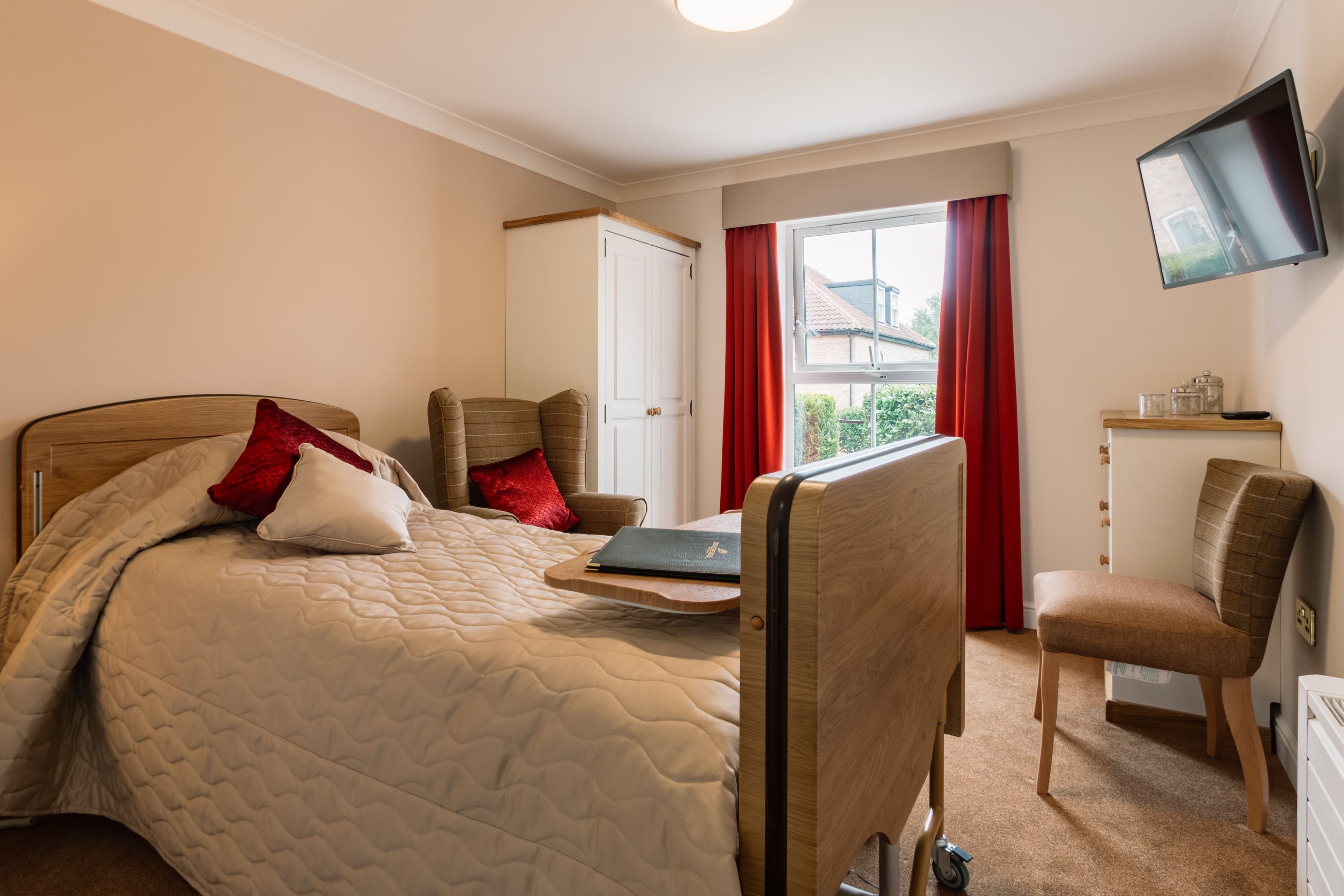 Bedroom at Stamford Bridge Beaumont Care Home in York, North Yorkshire