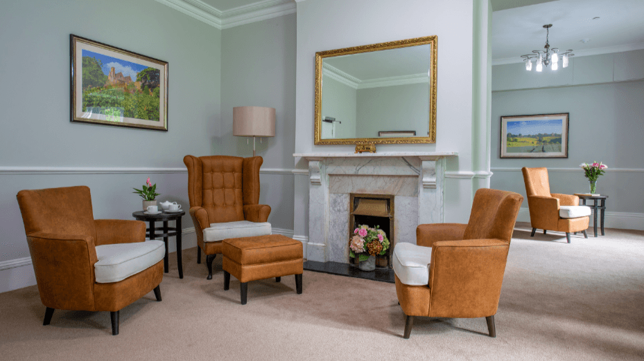 Communal Lounge at  Elm Grove Care Home in Cirencester, Gloucestershire