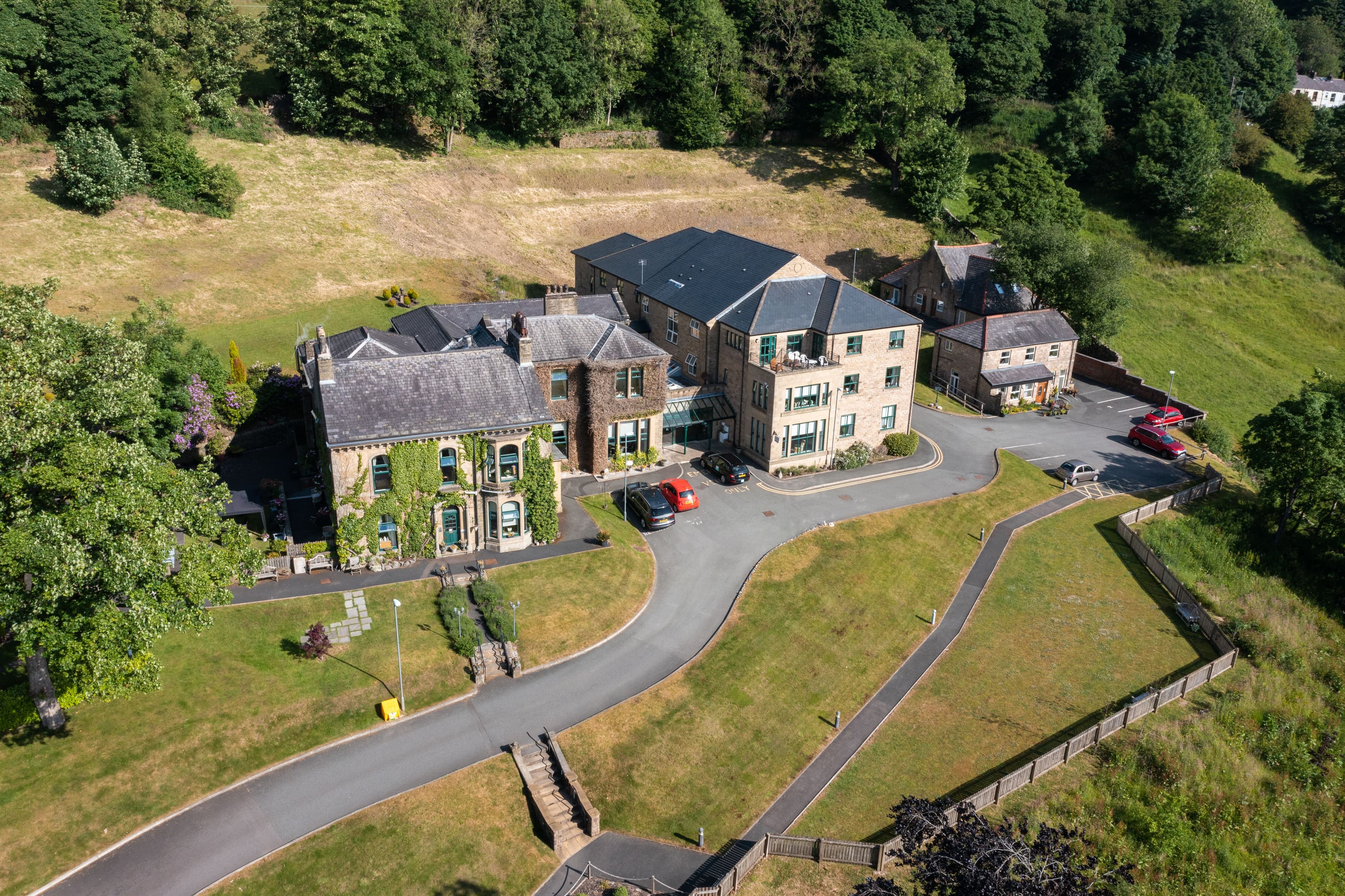 Exterior of Stones Wood Care Home in Oldham, Greater Manchester