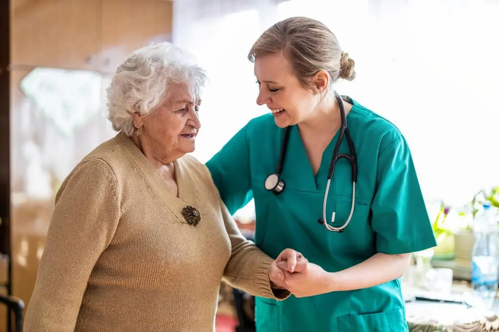 Dementia resident with female carer