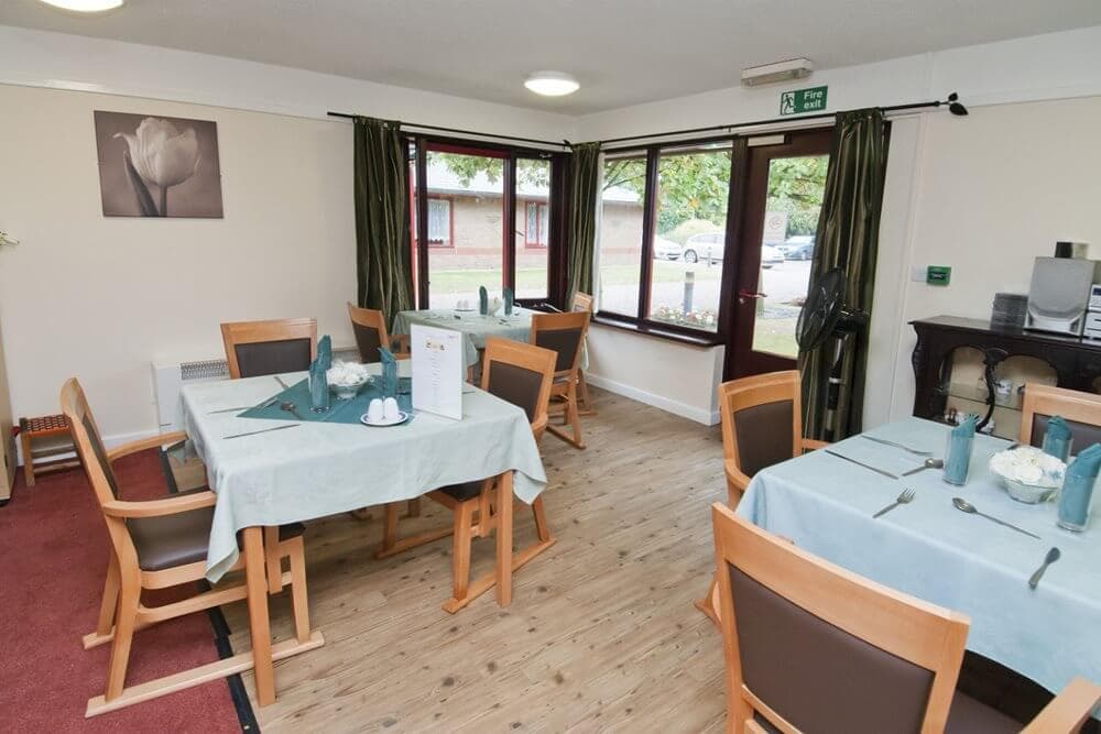 Dining room of Echelforde care home in Ashford, Surrey