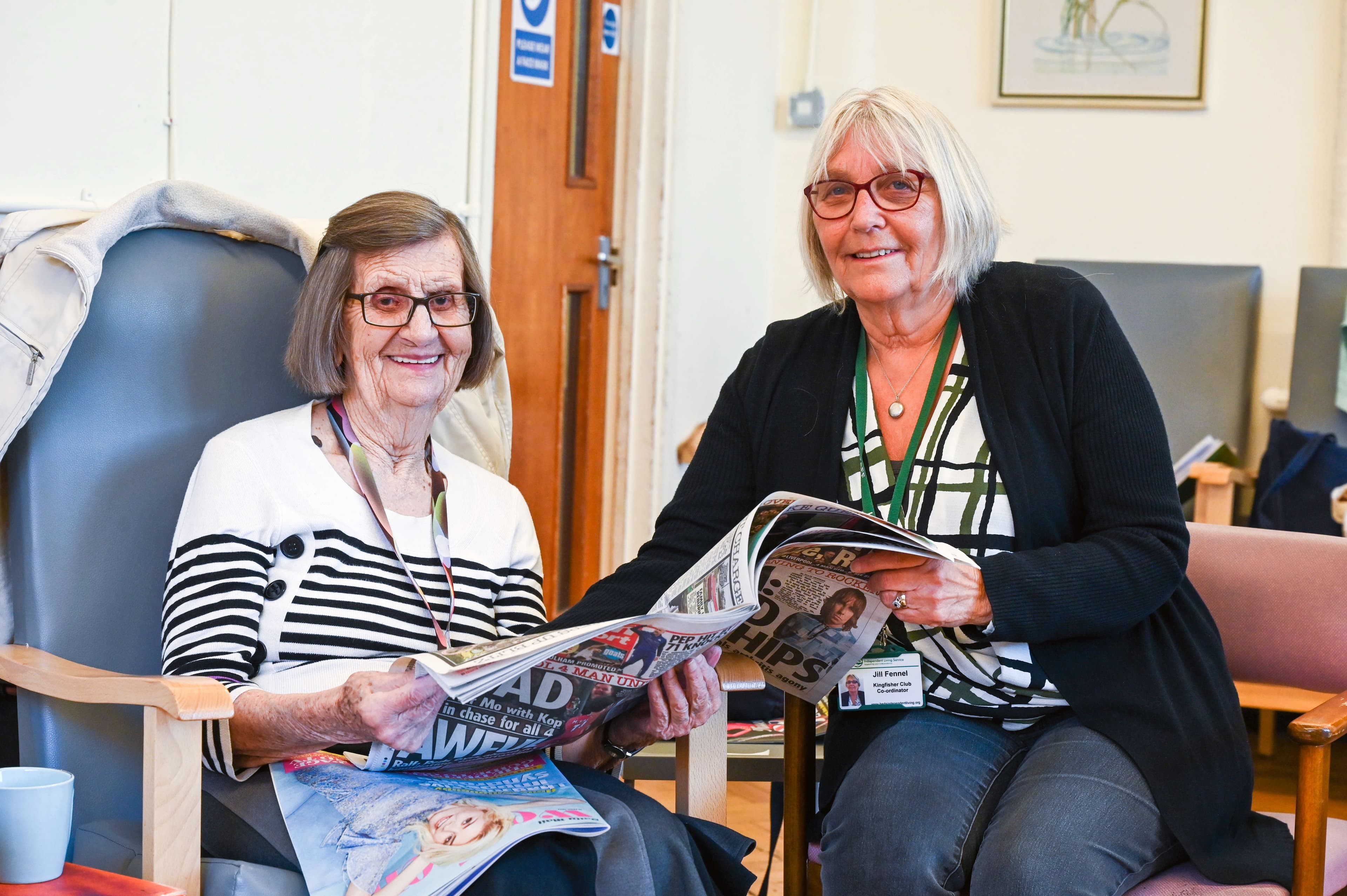Elderly woman with a female carer