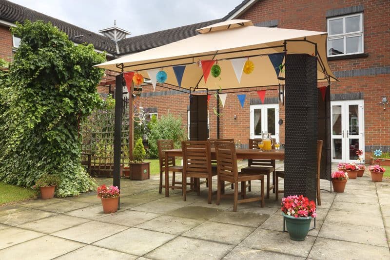 Garden of Hollins Park Care Home in Macclesfield, Cheshire East