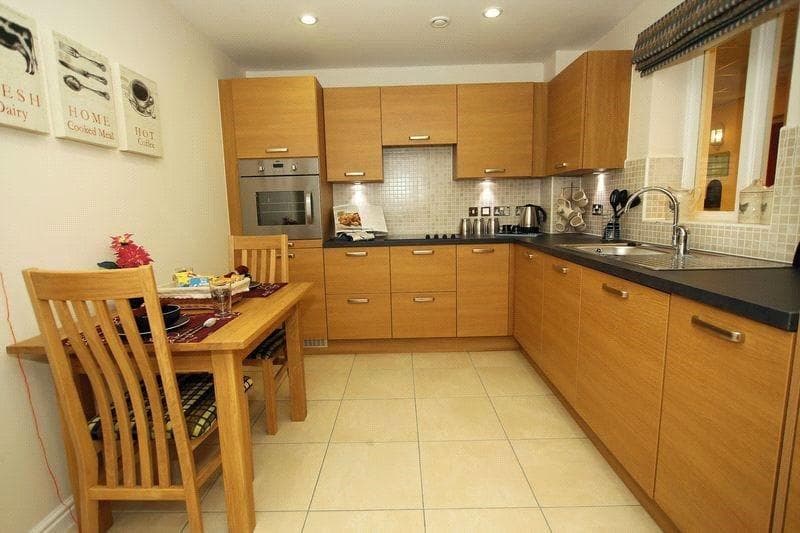 Kitchen of Earlsdon Park Village retirement development in Coventry, West Midlands