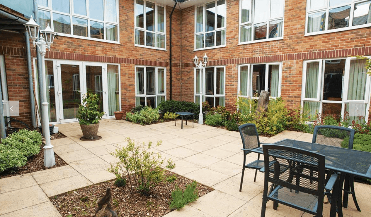 Garden of Maiden Castle House care home in Dorchester, Dorset