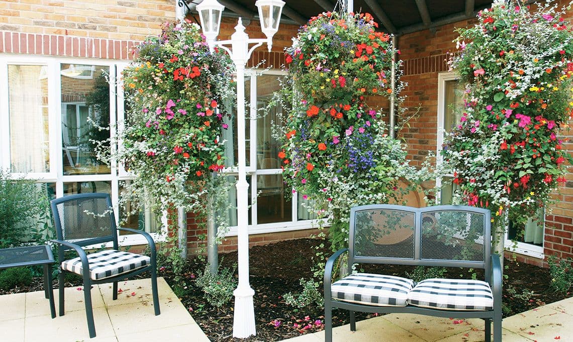 Garden of Maiden Castle House care home in Dorchester, Dorset