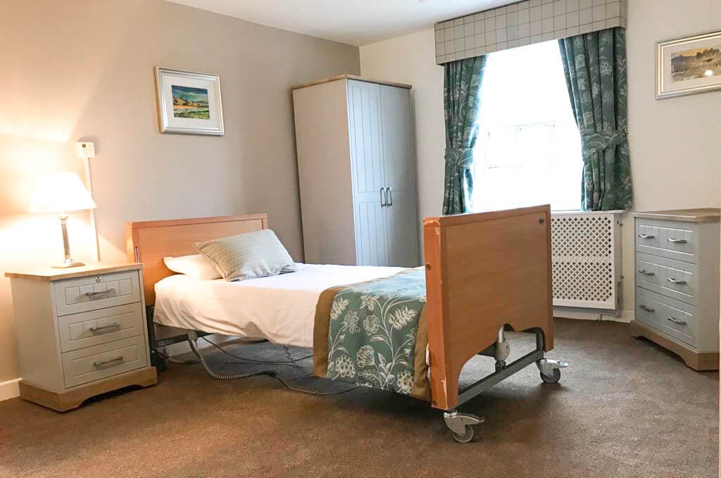 Bedroom of Northleach Court care home in Cheltenham, Gloucestershire