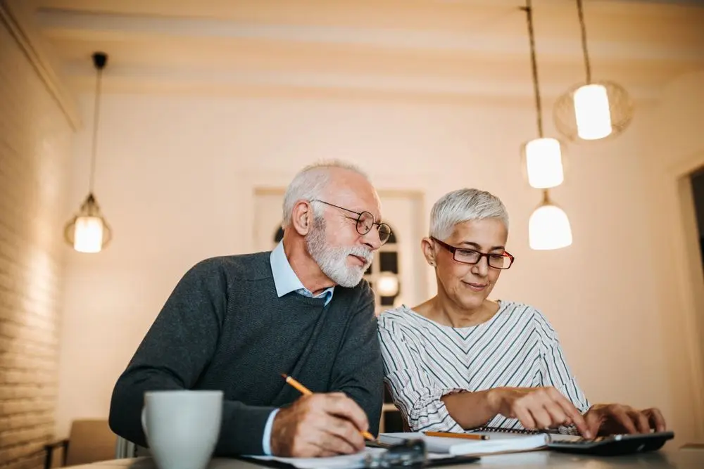 Older couple doing paperwork together