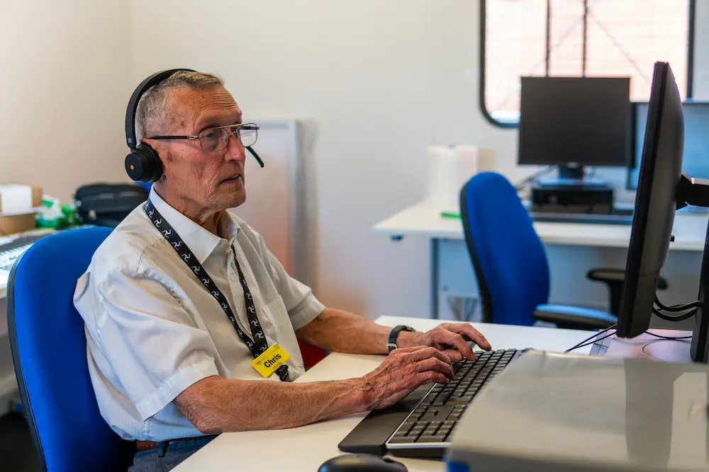 Older man working on a computer