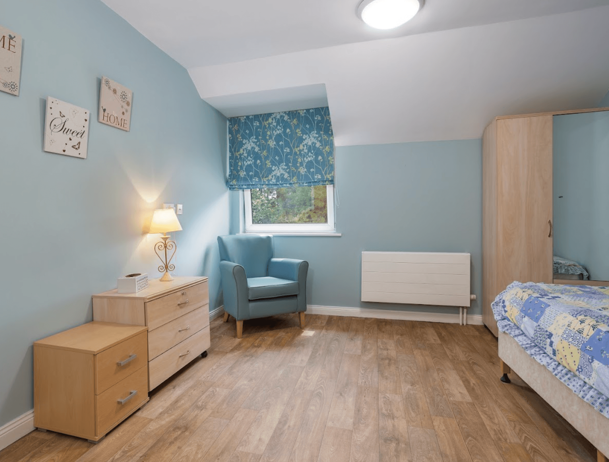 Bedroom of Craigend Gardens care home in Glasgow, Scotland