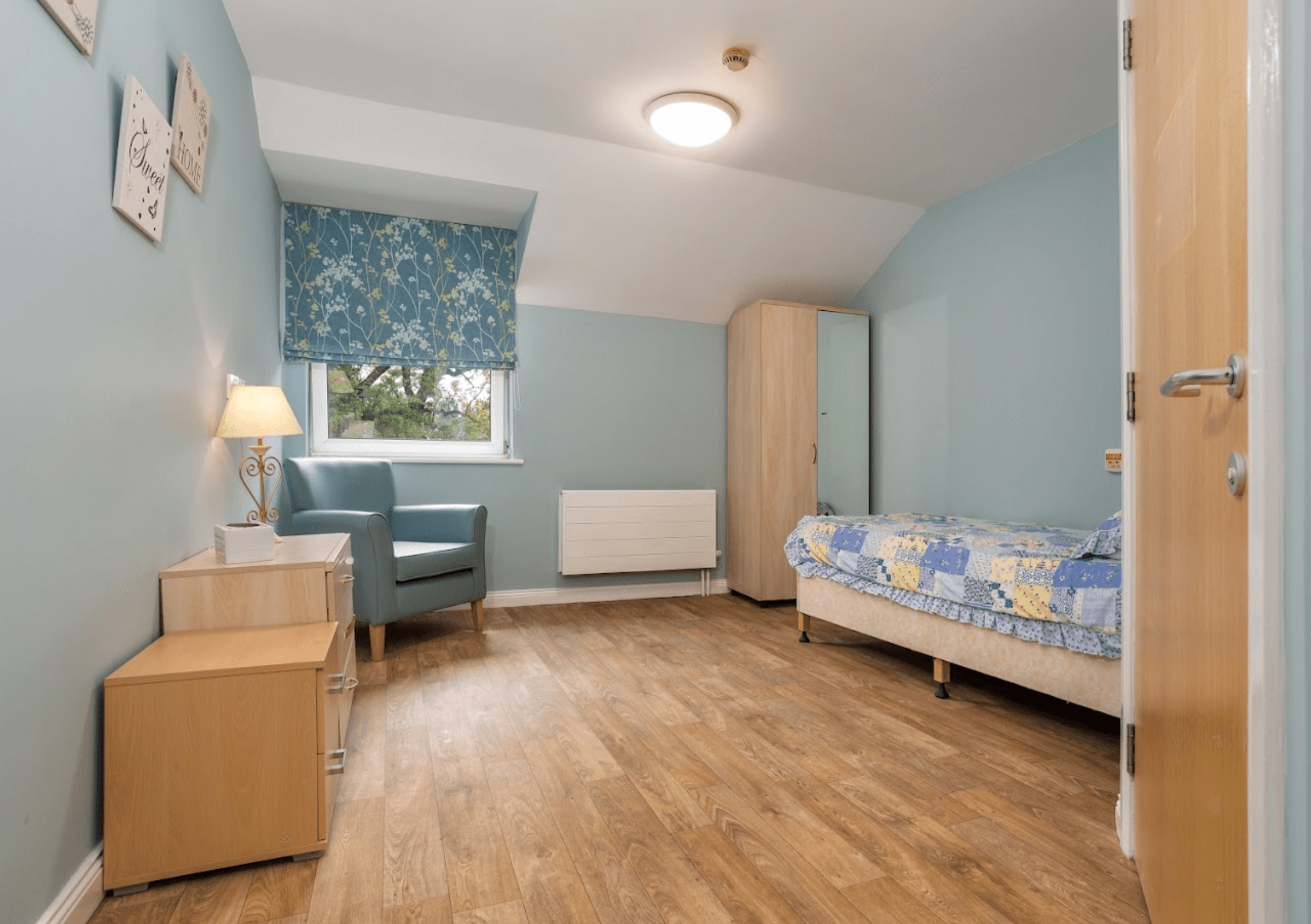 Bedroom of Craigend Gardens care home in Glasgow, Scotland