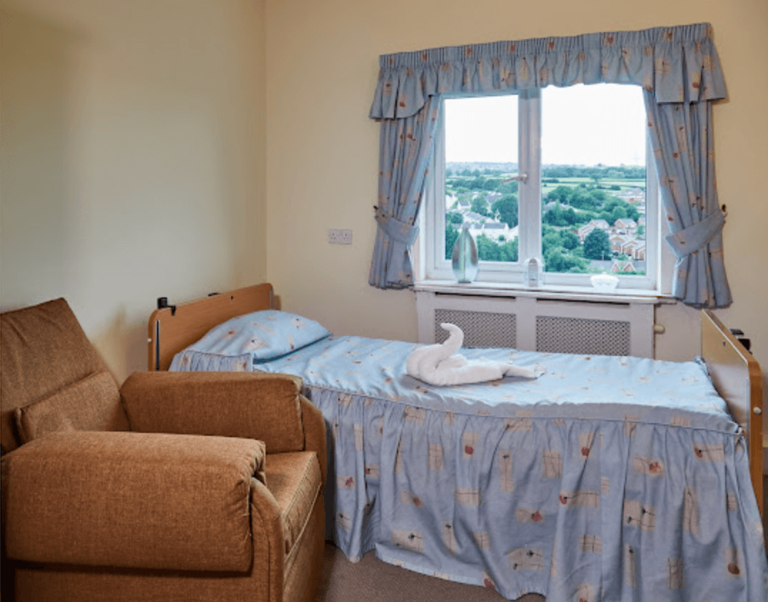 Bedroom of Rhiwlas care home in Flint, Wales