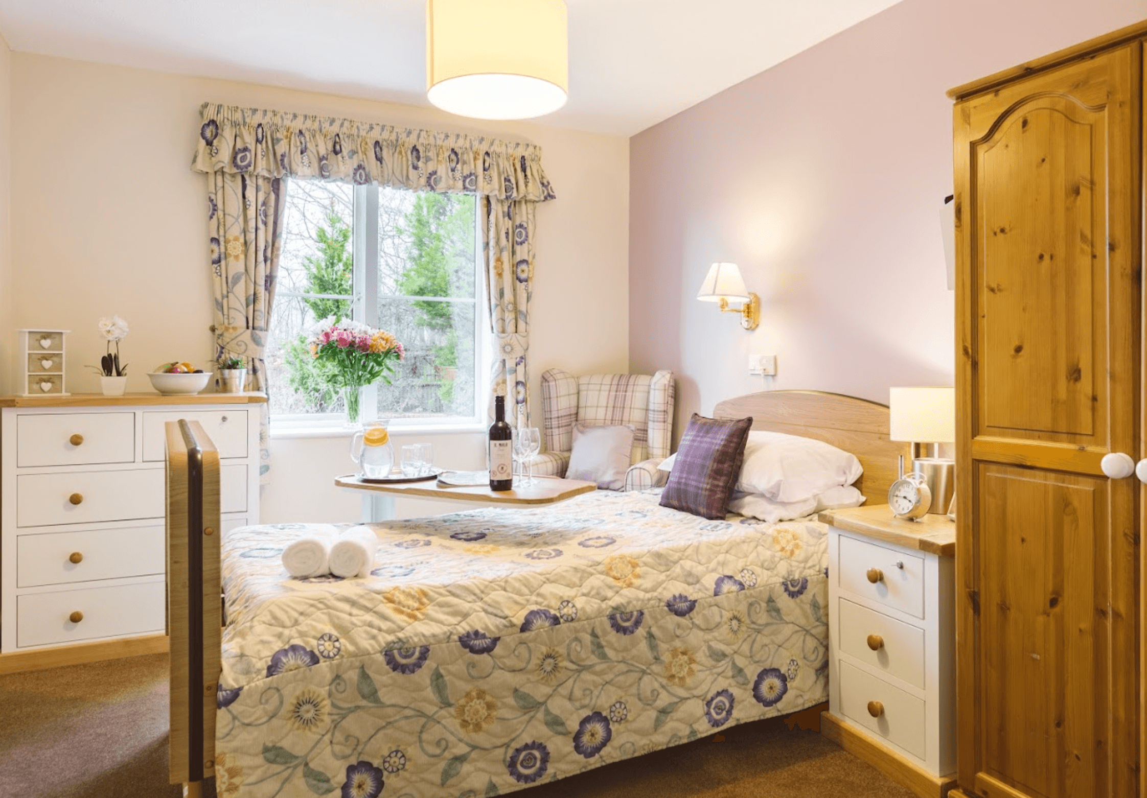 Bedroom of The Rhallt care home in Welshpool, Wales