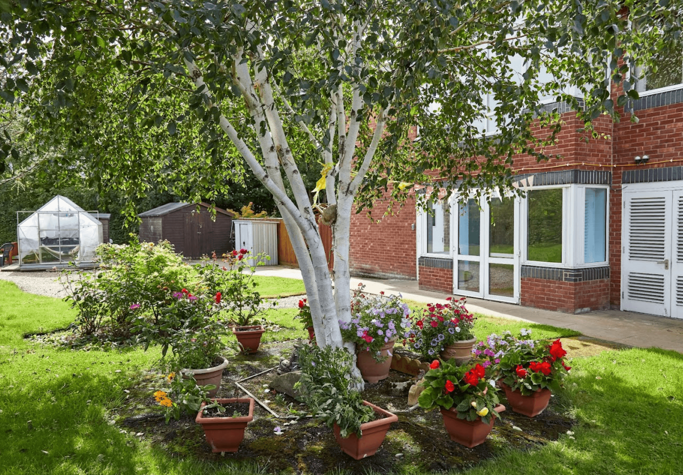 Garden of The Rhallt care home in Welshpool, Wales