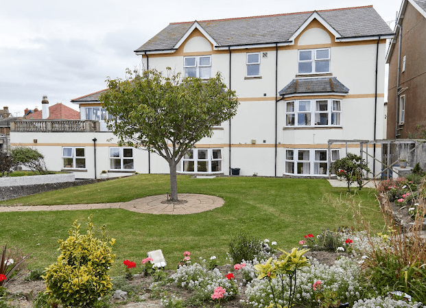 Garden of Bradshaw Manor care home in Rhyl, North Wales