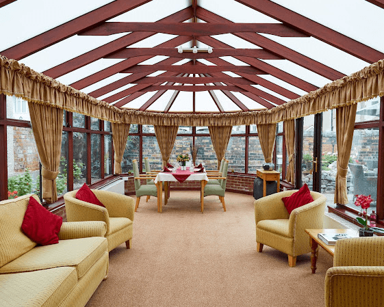 Lounge of Bradshaw Manor care home in Rhyl, North Wales