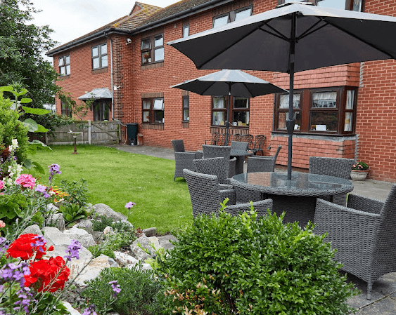 Garden of Bradshaw Manor care home in Rhyl, North Wales