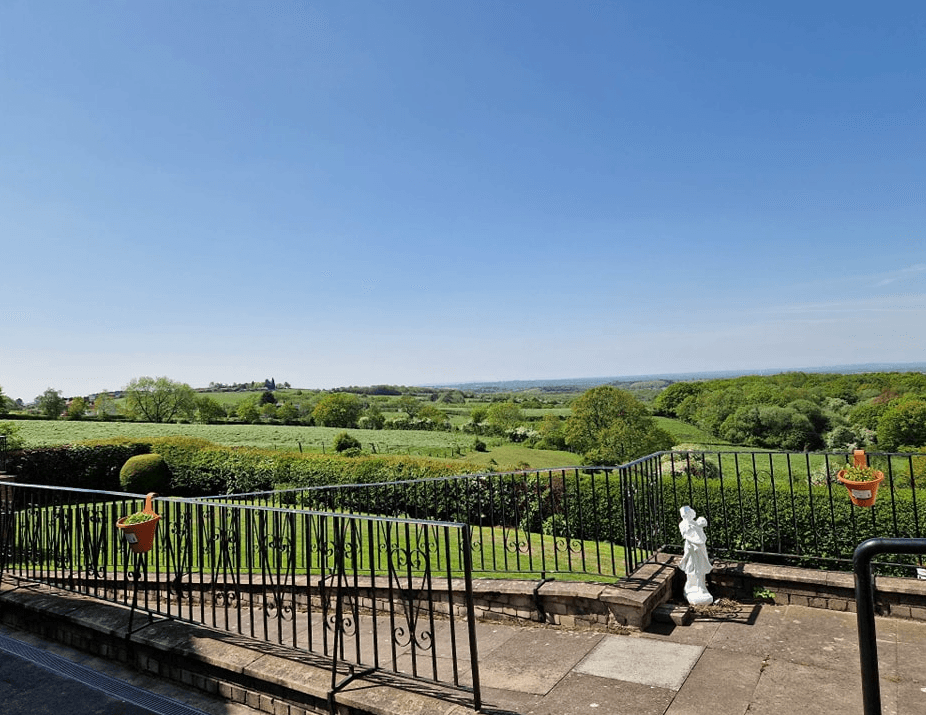 Garden of The Poplars care home in Alsagers Bank, Stoke-on-Trent