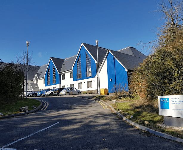 Exterior of Warren Lodge care home in Ashford, Kent