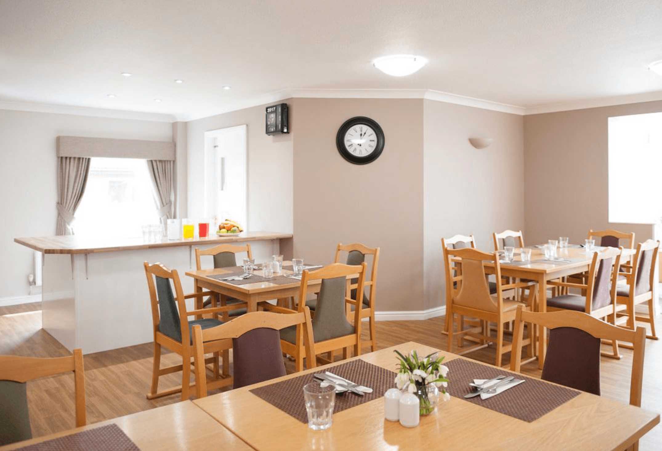 Dining room of Abbotsleigh Mews care home in Sidcup, Greater London