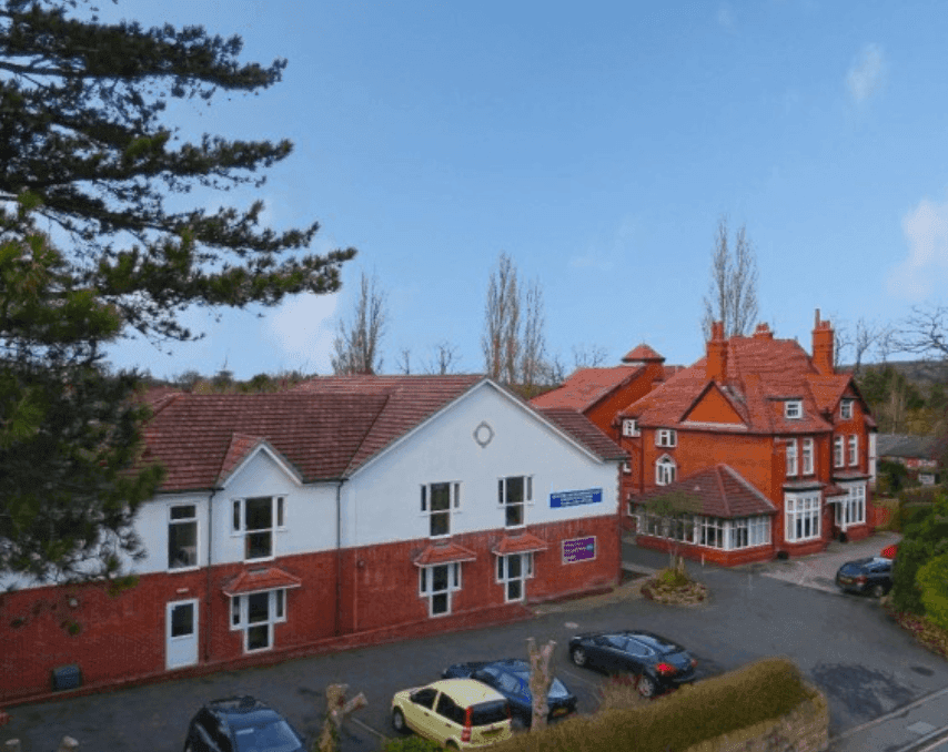 Exterior of Woodheath care home in Upton, Wirral