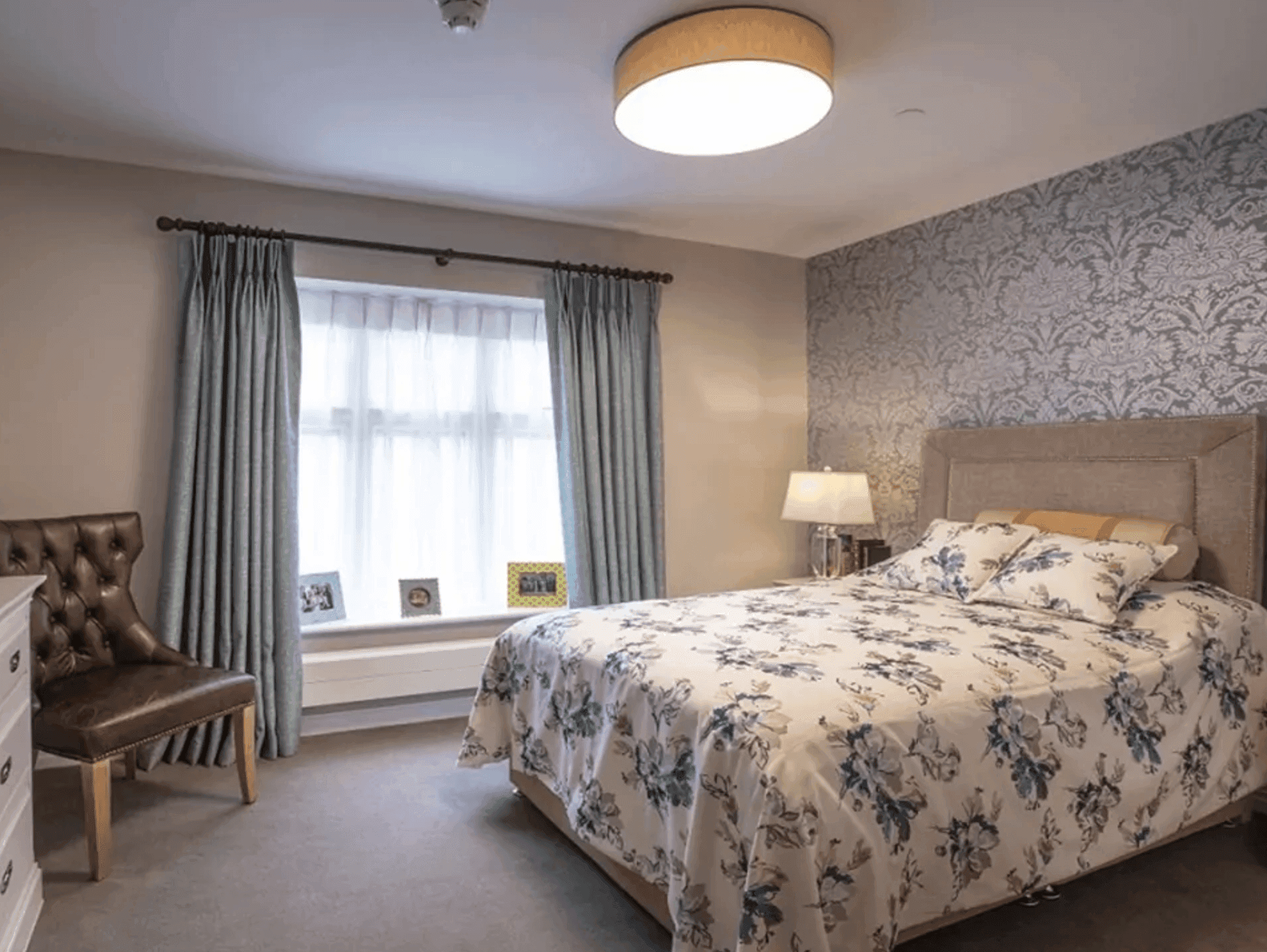 BEdroom of Bagshot Gardens Care Home in Surrey, South East England