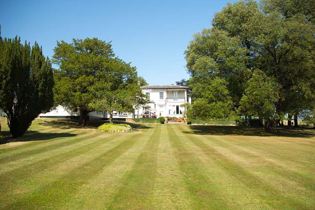 Garden of Stone House care home in Aylesbury