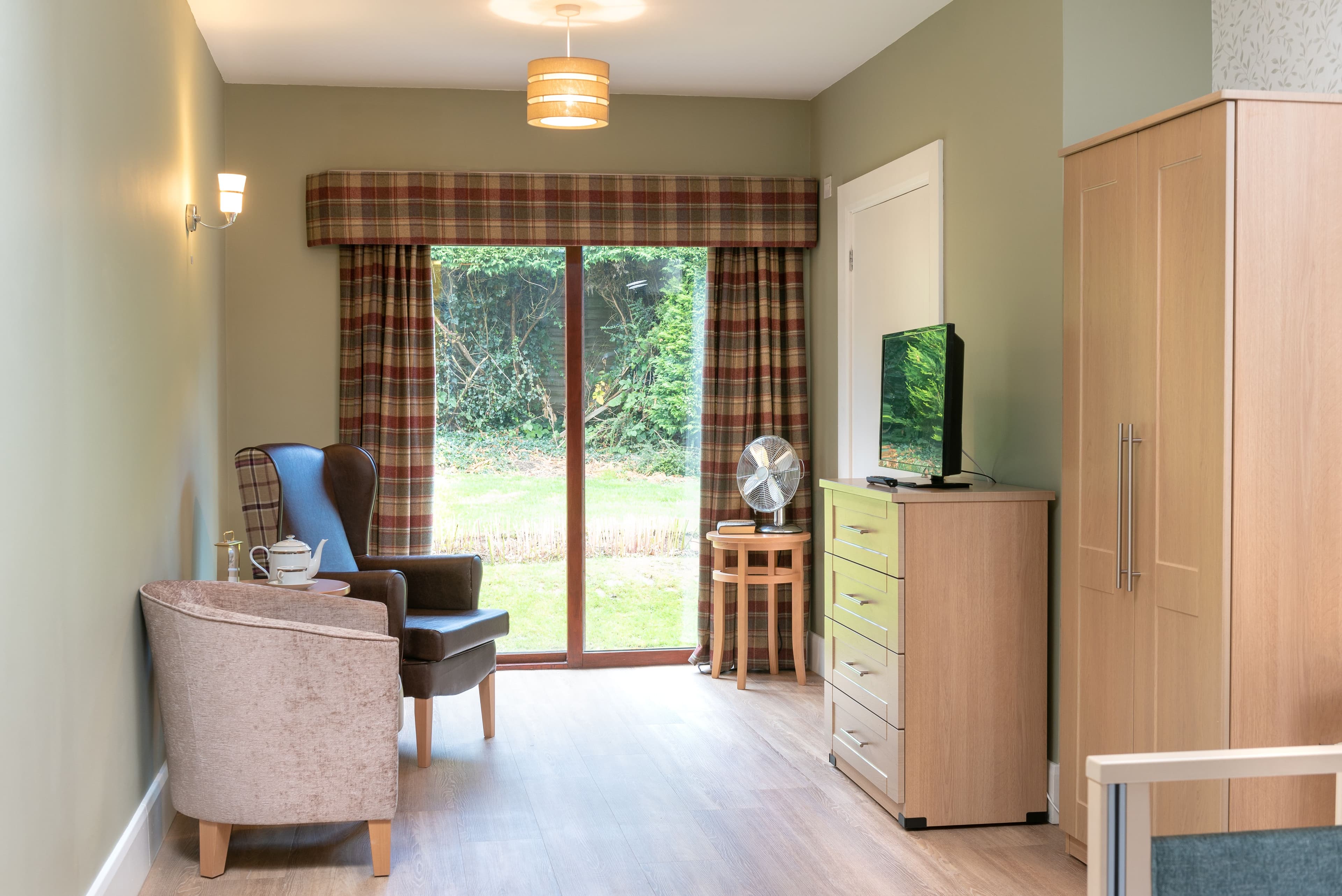 Bedroom of The Poplars care home in Maidstone, Kent