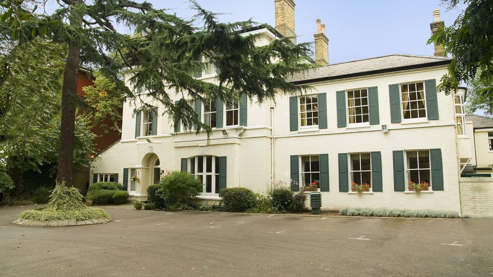 Exterior of The Pines Care Home in London, England