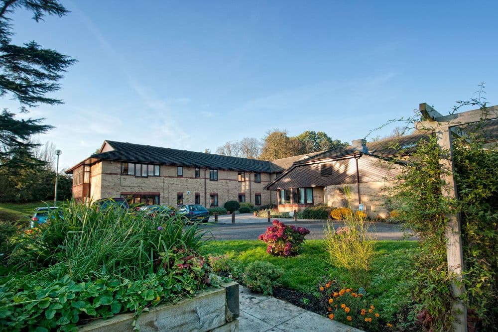 Exterior of Woodland Hall Care Home in Stanmore, Harrow