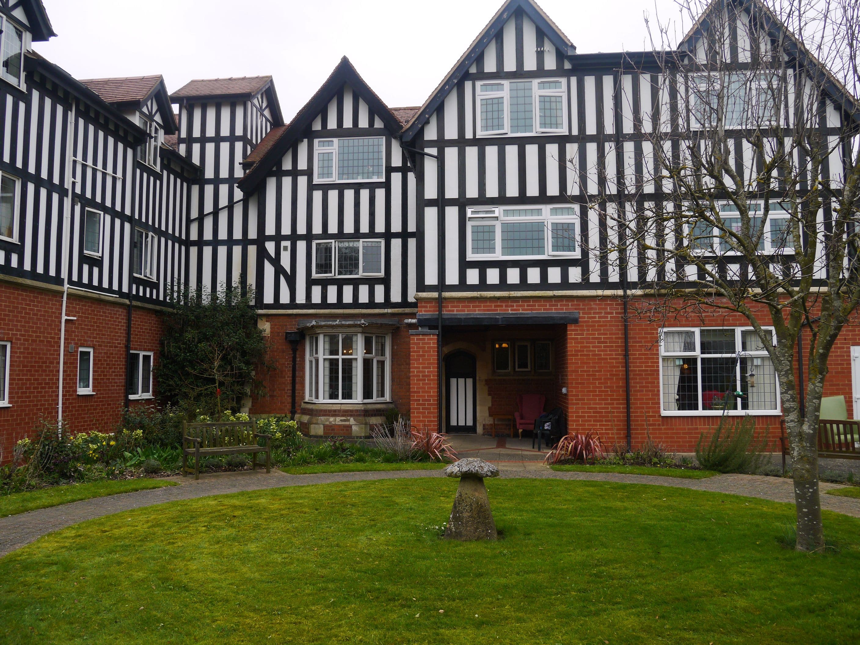 Exterior of Woodstock Care Home in Gloucester, Gloucestershire