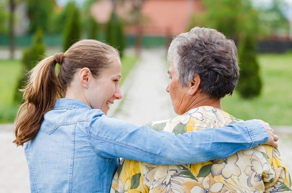 Young carer with an elderly woman