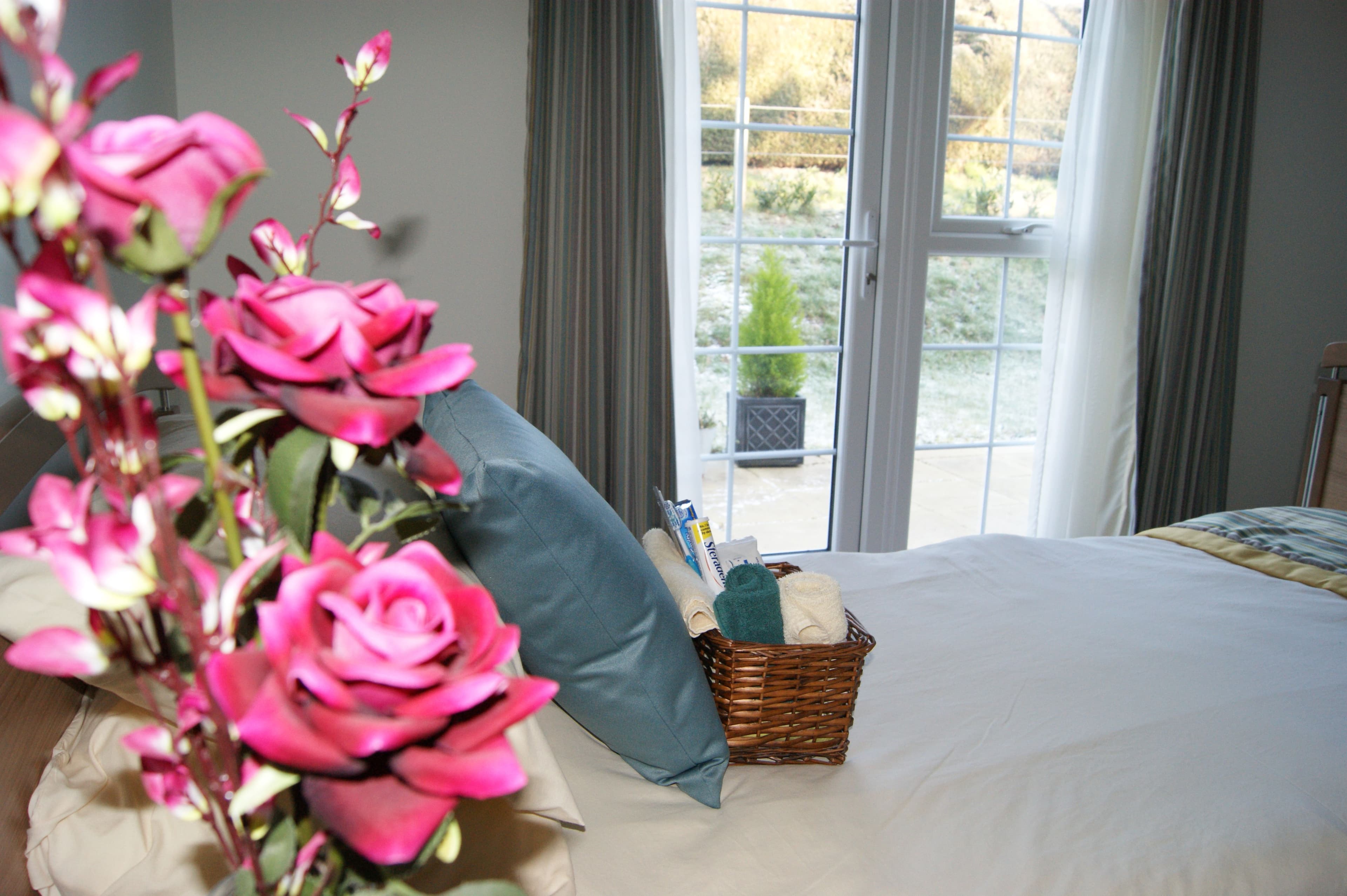 Bedroom at Downs House Care Home in Petersfield, Hampshire