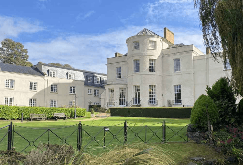 Exterior of Beauchamp House care home in Taunton, Devon
