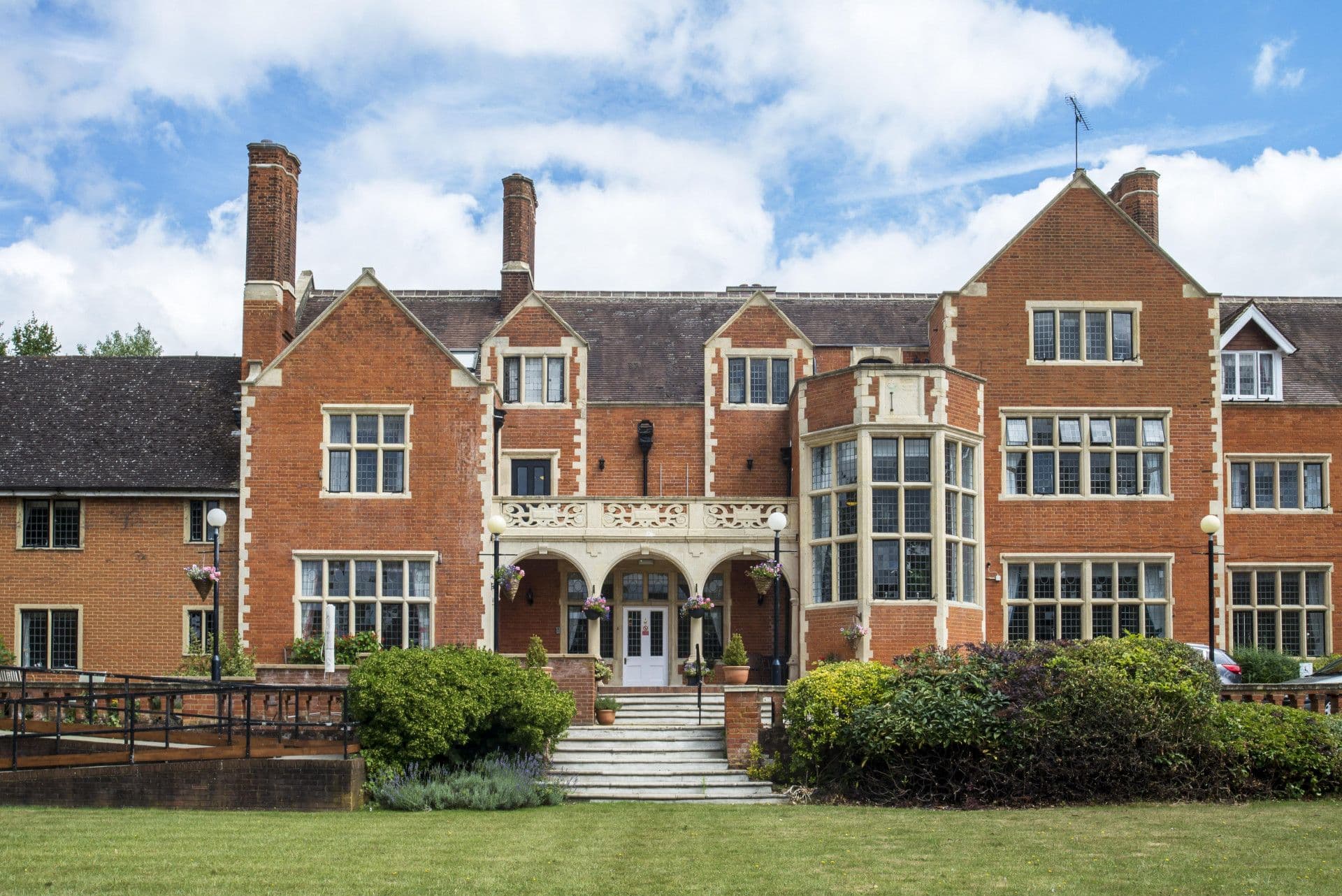 Exterior of Milner House Care Home in Leatherhead, Mole Valley