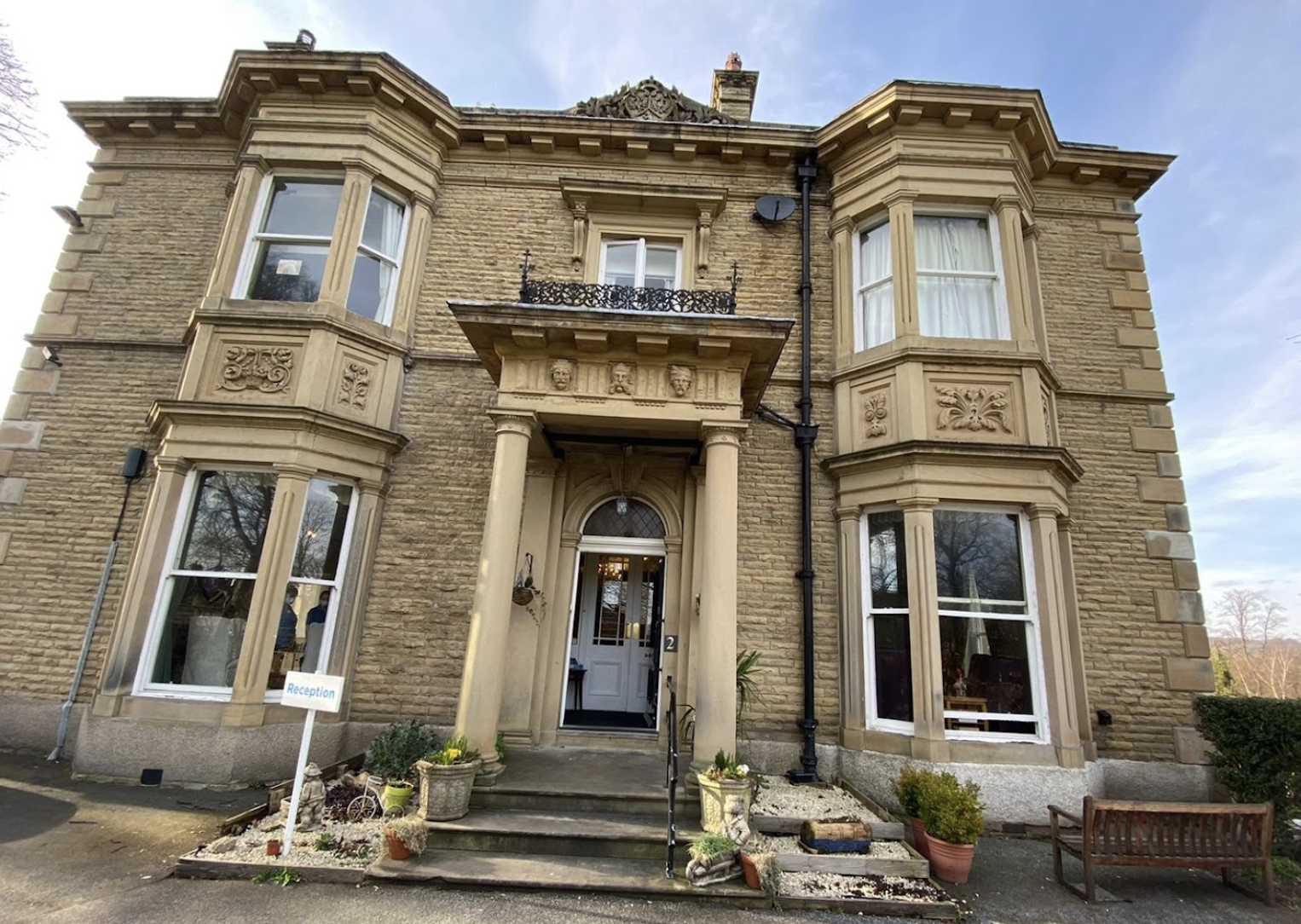 Exterior of Cleveland House care home in Huddersfield, West Yorkshire