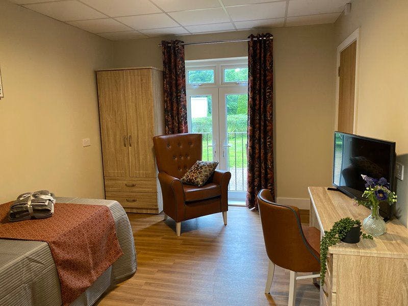 Bedroom at Abbey Chase Care Home in Chertsey, Runnymede