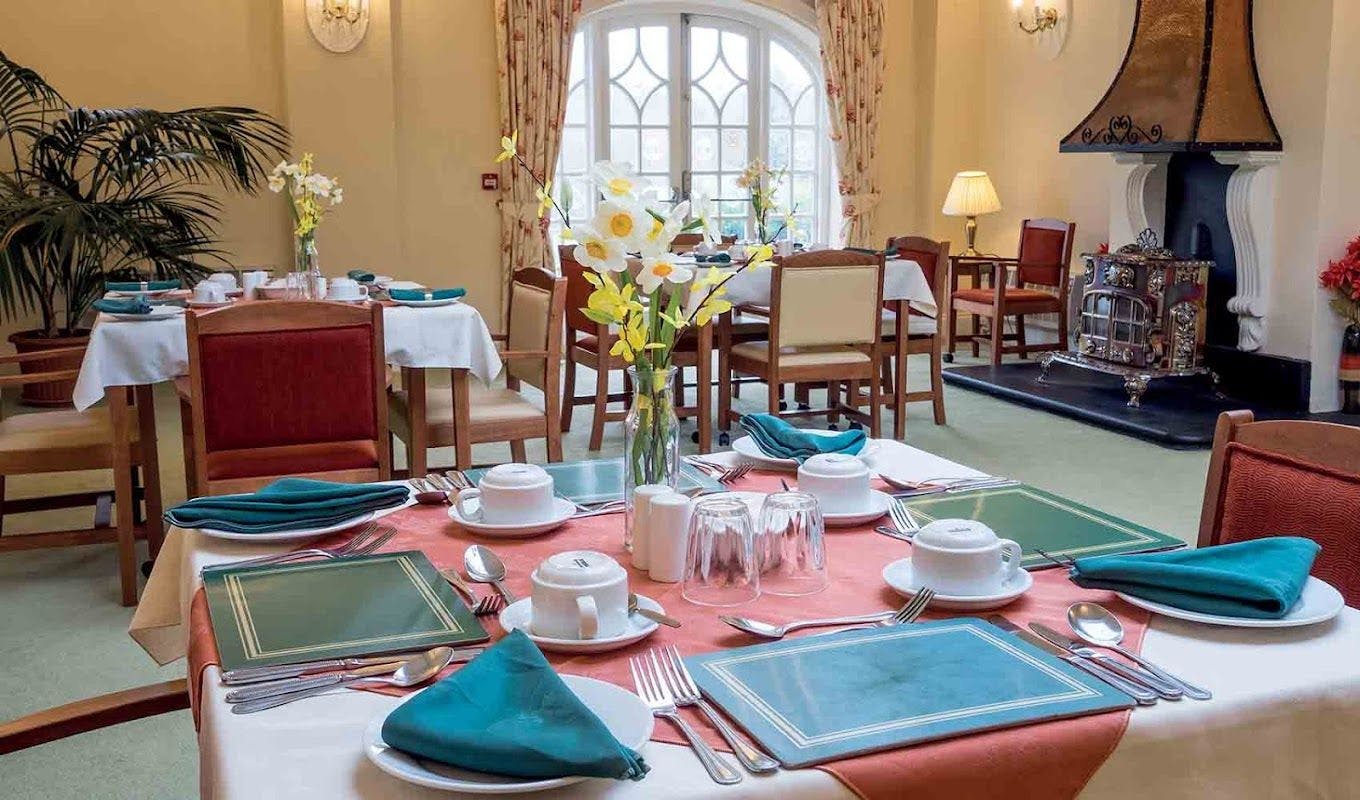 Dining room of Kenwith Castle care home in Bideford, Devon