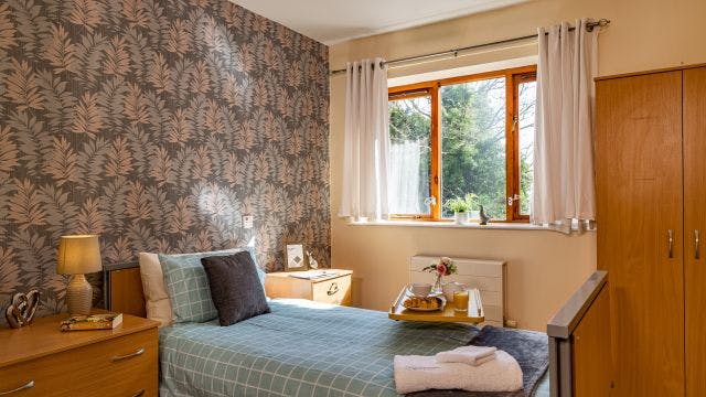Bedroom at Corinthian House Care Home in Leeds, West Yorkshire