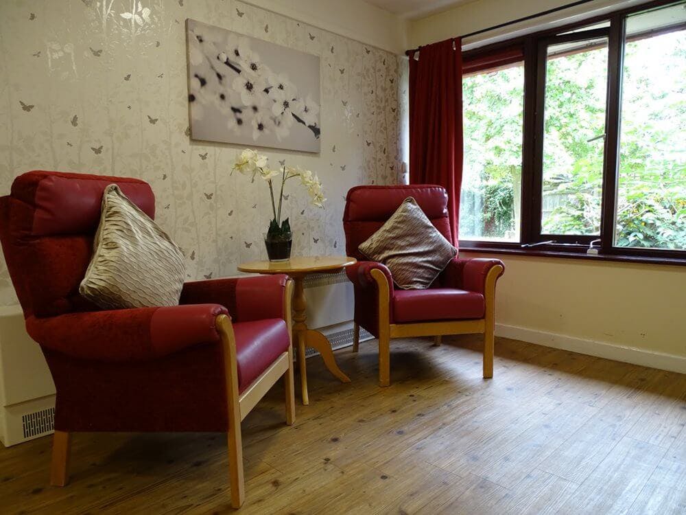 Lounge of Echelforde care home in Ashford, Surrey