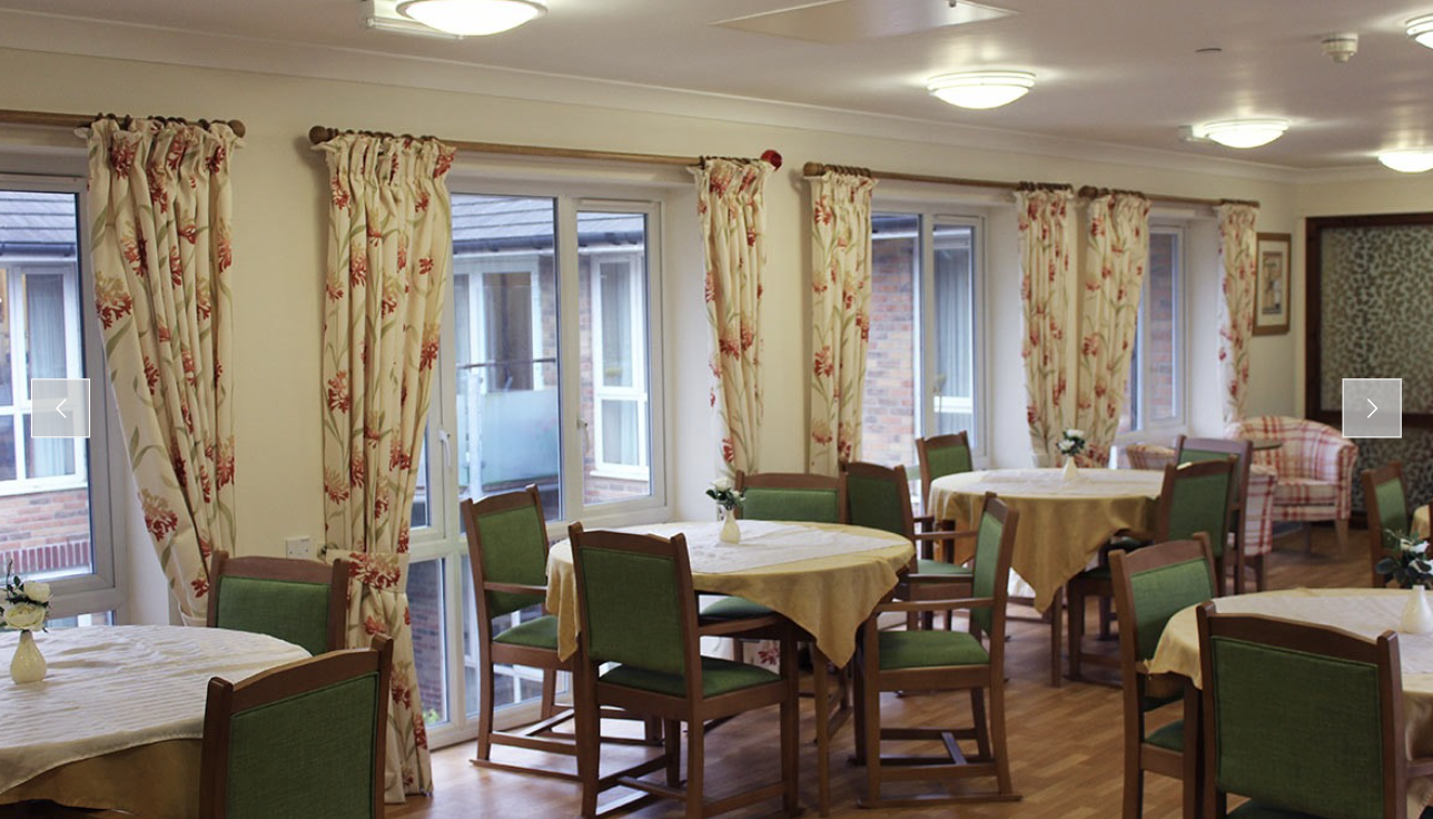 Dining room of Maiden Castle House care home in Dorchester, Dorset