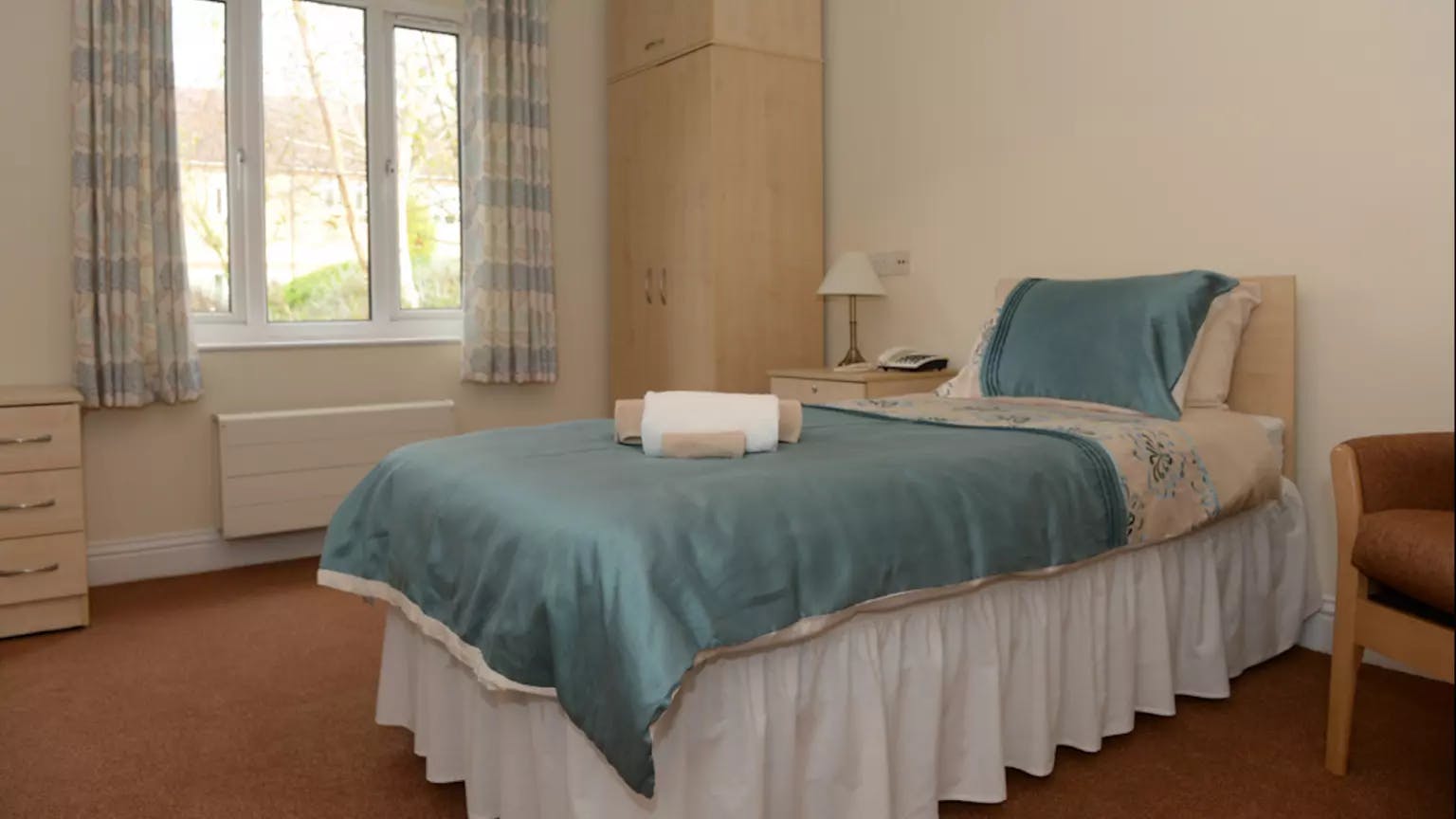 Bedroom of Mayfair Lodge care home in Watkins Rise, Hertfordshire