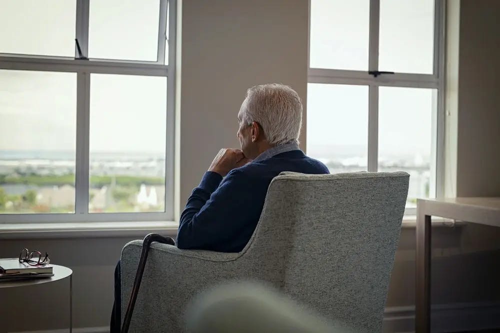 Old man experiencing a sense of isolation