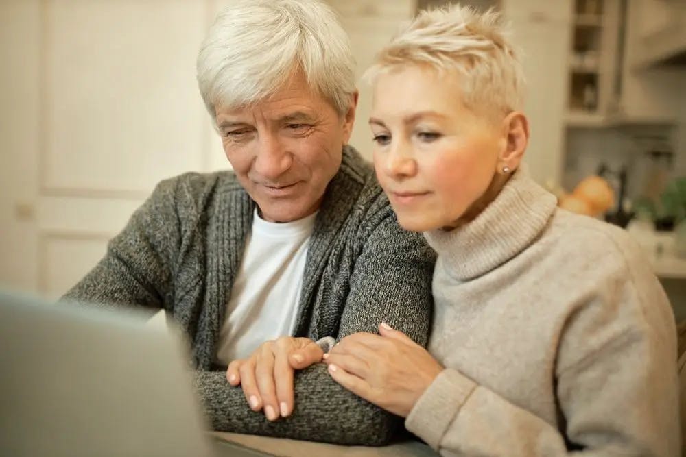 Older couple using a laptop together