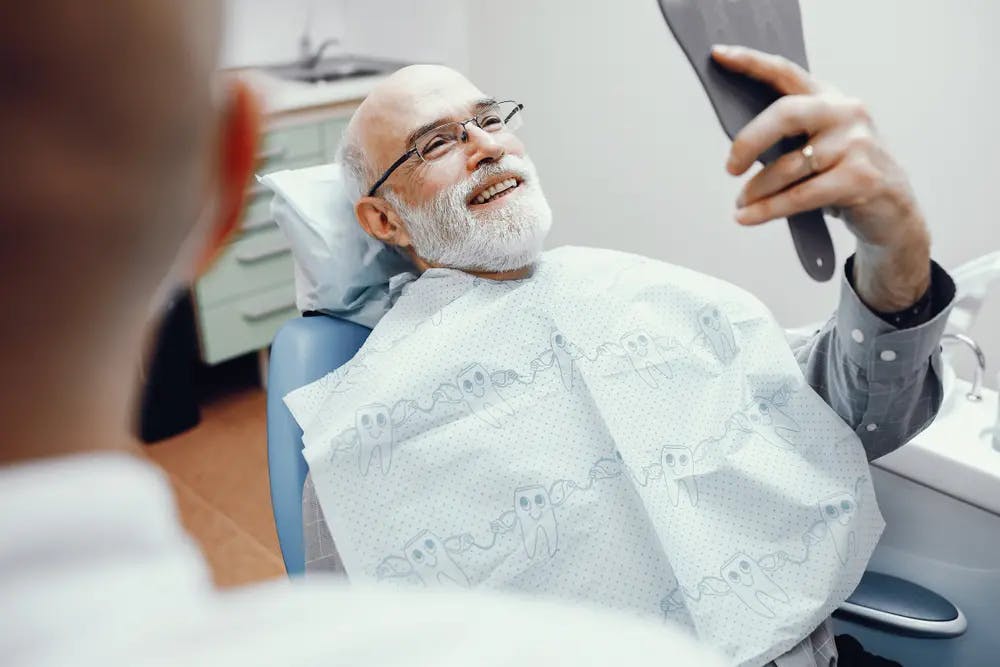 Older man at the dentist